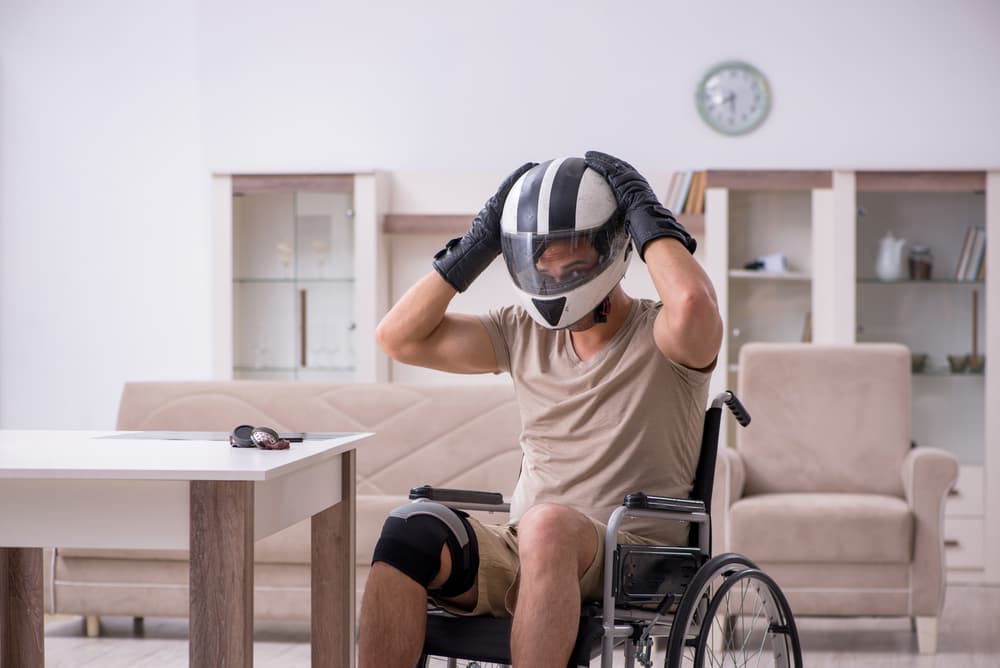 A person on wheelchair wearing helmet