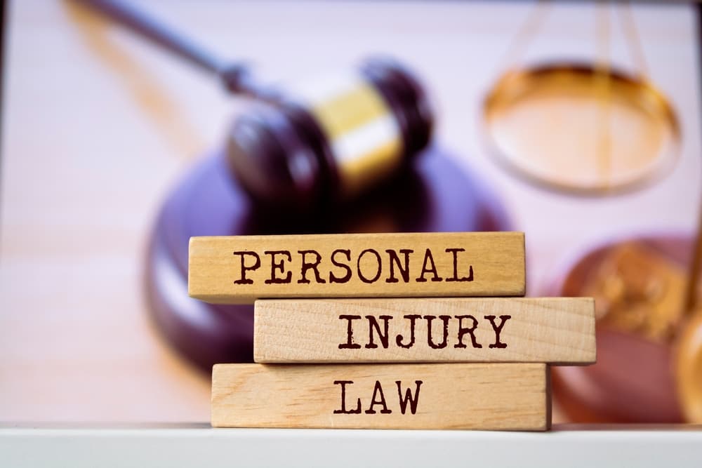 Wooden blocks with words 'Personal Injury Law'.