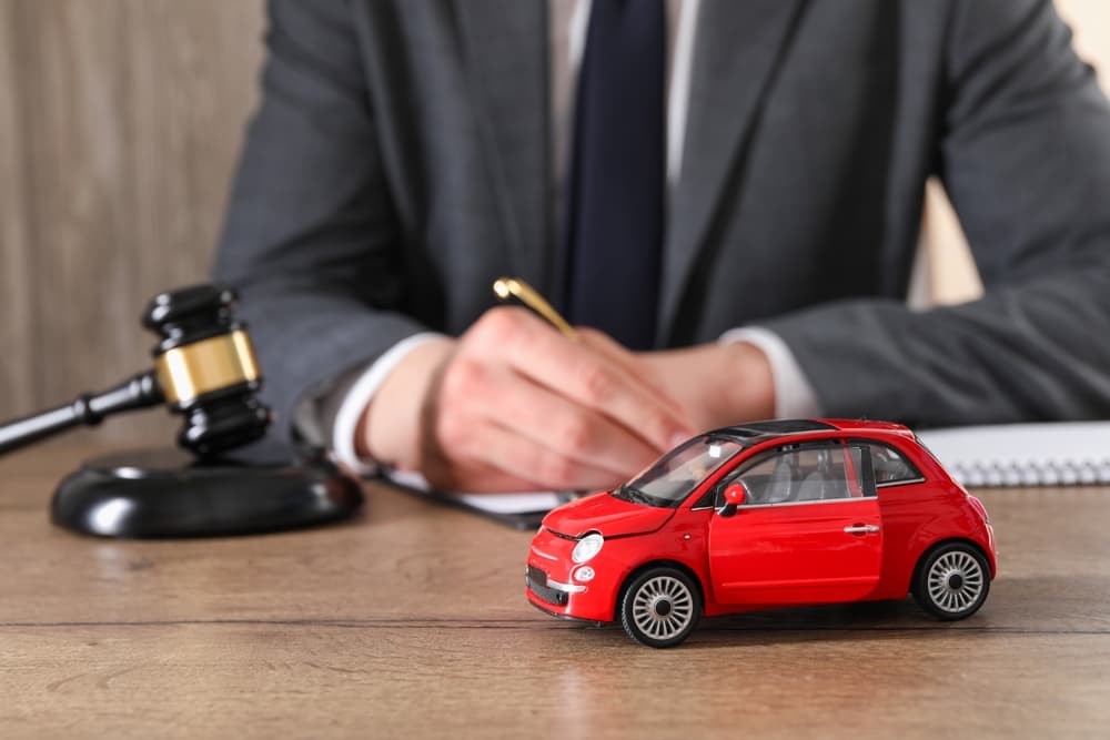 Car Accident Lawyer working in his office